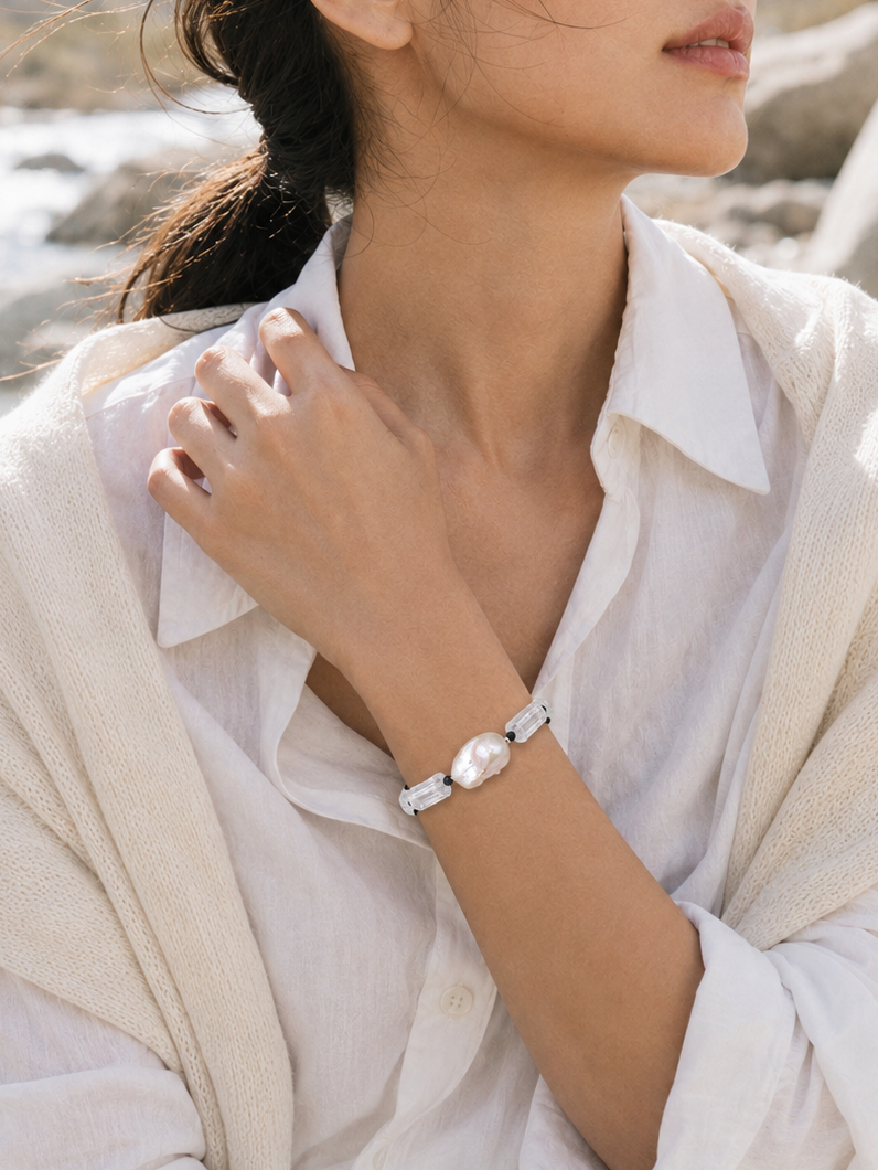 Black and white natural stone pearl bracelet lifestyle image