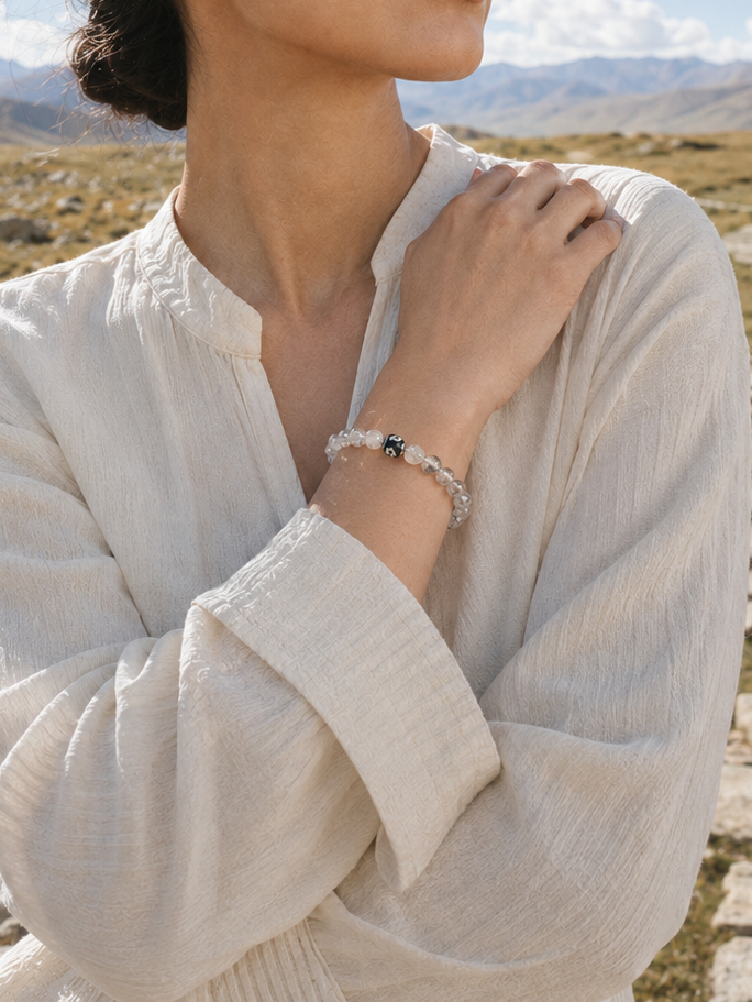 Black rutilated quartz bracelet styled as minimal crystal jewelry