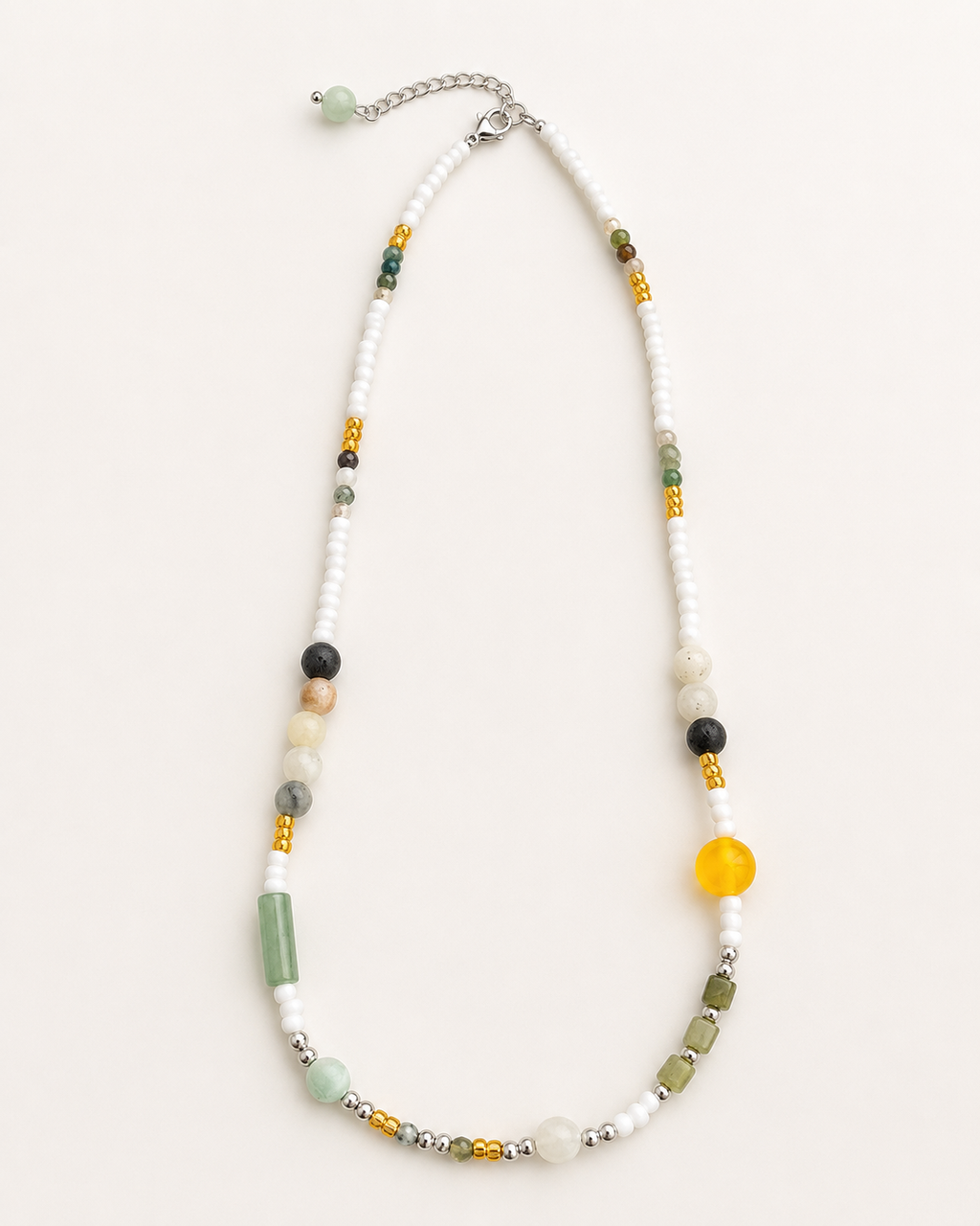Green natural stone and white bead short necklace by Kasa Himalaya