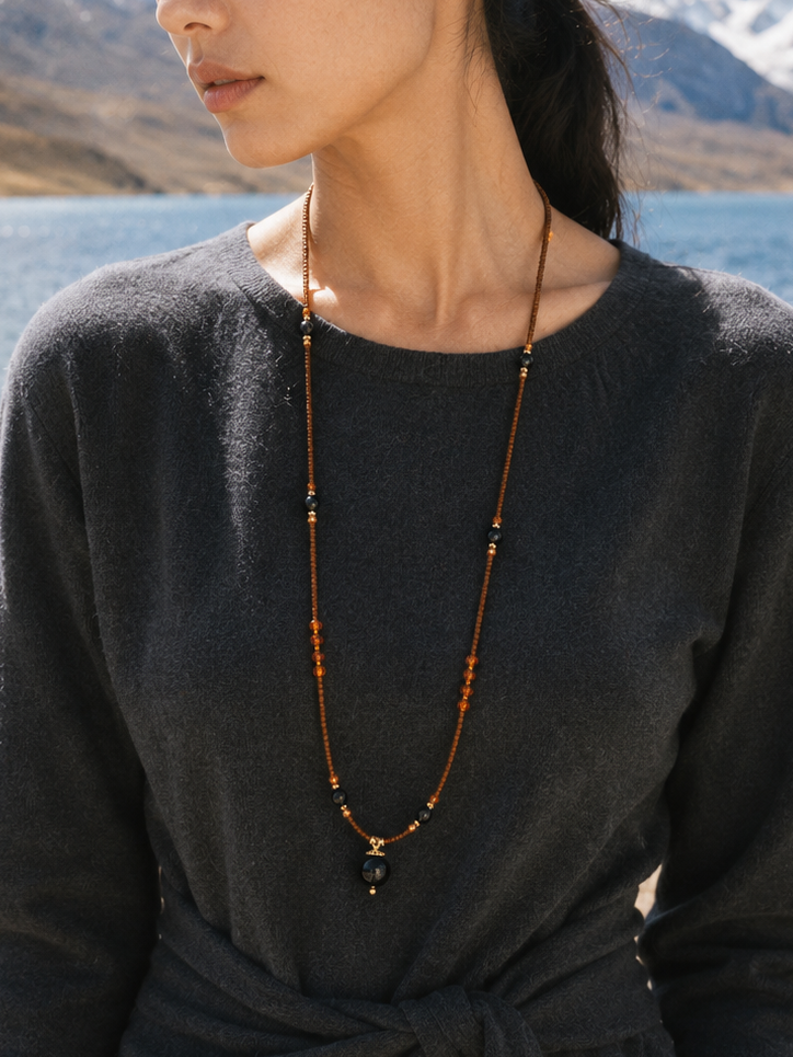 Black obsidian agate long necklace lifestyle image for grounding jewelry