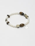 Tiger eye agarwood silver bracelet with warm wood and stone texture